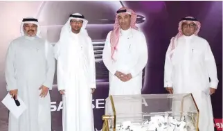  ??  ?? Officials of the Nissan “Win a Car” campaign during the ceremony to announce the winner in Jeddah.