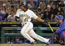  ?? GENE J. PUSKAR/THE ASSOCIATED PRESS ?? Pittsburgh Pirates infielder Gift Ngoepe, a native of South Africa, singled off Cubs pitcher Jon Lester in his first at-bat last month.