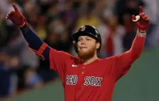  ?? MATT STOnE / hErAld STAff filE ?? GIVE THEM A HAND: Alex Verdugo celebrates his RBI double during Game 4 of the ALDS on Monday night.