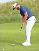  ?? JANE BARLOW/PA VIA AP ?? Jon Rahm is looking to win back-to-back major titles at the British Open this week after winning the U.S. Open in June.