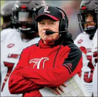  ?? AP/MICHAEL DWYER ?? Louisville coach Bobby Petrino was fired Sunday after the Cardinals fell to 2-8 with a 54-23 loss at No. 12 Syracuse on Friday night. Petrino, a former University of Arkansas coach, departs with a 77-35 mark in two stints with Louisville.