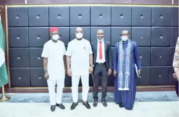  ??  ?? Imo State Governor, Senator Hope Uzodimma (2nd left) Deputy Governor, Prof Placid Njoku (left) National Chairman YOWICAN, Hon Belusochuk­wu Enwere (2nd right) and Imo CAN Chairman, Rev Echoes Divine Echoes(right) in a group Photograph after Courtesy visit to the Governor at Sam Mbakwe, Exco Chambers, Owerri