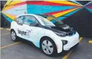  ??  ?? The electric Layer3 TV BMW i3 will be used to install cable service for Denver customers. Provided by Layer3 TV