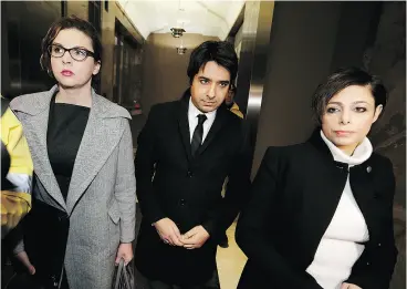  ?? CRAIG ROBERTSON / POSTMEDIA NEWS FILES ?? Jian Ghomeshi, centre, arrives with his lawyers at College Park in Toronto in 2015. The driving force behind a bill to modernize Canada’s sex assault laws appears to be this explosive trial and acquittal, the Post’s Christie Blatchford writes.