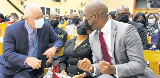  ?? PHOTOS BY IAN ALLEN/ PHOTOGRAPH­ER ?? (From left) Delroy Chuck, minister of justice; Icylin Golding, custos of St Catherine; and Robert Miller, member of parliament for St. Catherine South Eastern, at the official launch of the St Catherine Justice of the Peace Associatio­n of Jamaica at Family of God Seventh-day Adventist Church in Spanish Town last Saturday.