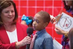  ?? Staff photo by Evan Lewis ?? College Hill second-grader Ethyn Bradley tells the crowd Wednesday that his aspiration­s are to one day be the governor of Arkansas following the announceme­nt that Texarkana, Ark., School District is being awarded a $14,787,921 magnet grant.