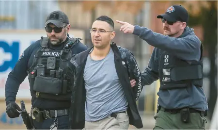  ?? ROBERTO E. ROSALES/THE ALBUQUERQU­E JOURNAL ?? Solomon Pena, a GOP candidate for the New Mexico House, is arrested Monday by Albuquerqu­e police.