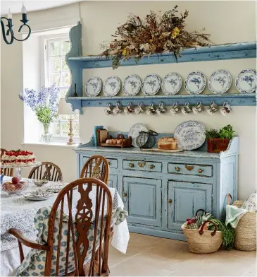  ??  ?? Left: The dresser and shelf were already in the kitchen, but Charlotte gave them a distressed finish that was more in keeping with the décor. She chose limestone flags from Beswick Stone, which work well with the electric underfloor heating