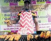  ??  ?? BRAAI MASTER: Magmoed Ibrahim of Mega Bite Take Outs braais crayfish tails