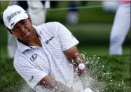  ?? JOE LEWNARD - DAILY HERALD ?? Hideki Matsuyama, of Japan, hits out of the bunker on the ninth hole during the BMW Championsh­ip in Medinah, Ill., on Aug. 16.