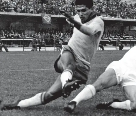  ??  ?? Up to the challenge: the defender tackles Brazil great Garrincha in Vina del Mar as England go