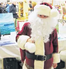  ?? File ?? Santa Claus — also known as Jamie Ross — provided a festive flavour to the 2017 Arisaig Christmas bazaar. This year, the event is scheduled for Sunday, Nov. 4, from 11 a.m. to 3 p.m., at the Arisaig Parish Community Hall.