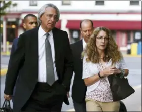  ?? PHOEBE SHEEHAN — CENTRE DAILY TIMES VIA AP ?? Attorney Tom Kline, left, walks with the parents of Timothy Piazza, Jim and Evelyn Piazza, toward the courthouse before a preliminar­y hearing resumes for members of a fraternity facing criminal charges over the death of their son, at the Centre County...