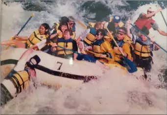  ?? Special to The Saline Courier ?? Aside from building speed boats, John Butler was a fan of white water rafting, including this trip where he tumbled into the water — one of many trips over the side he would take during his lifetime.