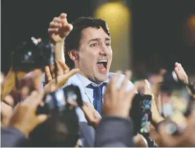  ?? DON MACKINNON / AFP VIA GETTY IMAGES ?? Liberal Leader Justin Trudeau speaks at a rally in Vancouver on Sunday before ending his election campaign later in the day in Victoria.