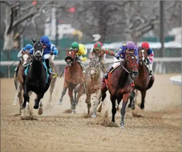  ?? PHOTO NYRA/ROBERT MAUHAR ?? Enticed, far left, with Junior Alvardo aboard Saturday afternoon along the turn of the Grade III Gotham for 3-year-olds at Aqueduct Racetrack.