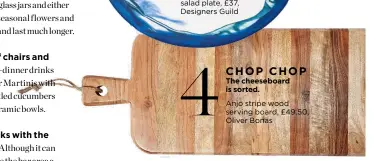  ?? ?? The cheeseboar­d is sorted.
Anjo stripe wood serving board, £49.50, Oliver Bonas CHOP CHOP