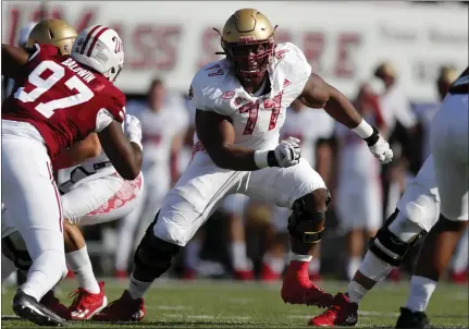  ?? MICHAEL DWYER – THE ASSOCIATED PRESS ?? Offensive lineman Zion Johnson (77) developed into a first-round prospect at Boston College after traveling a most unconventi­onal path.