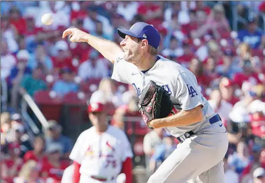  ??  ?? Los Angeles Dodgers starting pitcher Max Scherzer throws during the third inning of a baseball game against the St. Louis Cardinals, on Sept. 6, in St. Louis. (AP)