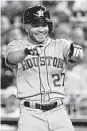  ?? Rob Carr / Getty Images ?? Jose Altuve became the first Astro to get a hit in the All-Star Game since Hunter Pence in 2011.