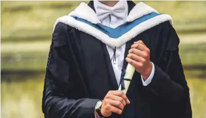  ??  ?? Racist theory: Are white doctoral graduates the only ones with quality degrees? Photo: Hannah Mckay/reuters