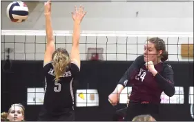  ?? PETE BANNAN – MEDIANEWS GROUP ?? Garnet Valley’s Sam Mann, right, fires the ball past Strath Haven’s Katie Rosini (5) in a match for the Central League title Wednesday night.