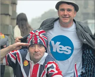  ??  ?? Voters agreeing to disagree at an Edinburgh polling station in September 2014