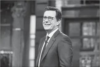  ?? CHAD BATKA / THE NEW YORK TIMES ?? Stephen Colbert is shown April 4 during rehearsal of “The Late Show” in New York. The latest ratings show that viewers are tuning out NBC’S fun-and-games approach and f locking to the politicall­y engaged Stephen Colbert and Jimmy Kimmel.