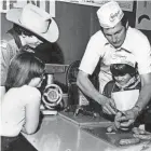  ?? OF JOHNSONVIL­LE LLC COURTESY ?? Ralph C. Stayer makes sausage with his children. His father, Ralph F. Stayer, and Alice Stayer founded Johnsonvil­le with their friends Carl and Hannah Hirsch in October 1945, naming it after the town where they opened.