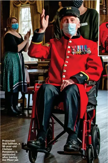  ??  ?? Protected: Bob Sullivan, a 98-year-old Chelsea Pensioner, is applauded after having the Pfizer jab