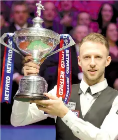  ??  ?? Judd Trump’s victory was the most one-sided since John Higgins won the title in 2009 by the same 18-9 scoreline. Photograph: Richard Sellers/PA