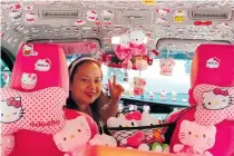  ?? CONTRIBUTE­D PHOTO ?? With her Hello Kitty-themed GrabCar, Erlita Lebosada proudly drives around the metro, ferrying passengers as she provides for her three young children.