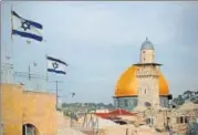  ?? AFP ?? Israeli flags fly near the Dome of the Rock in the Alaqsa mosque compound.