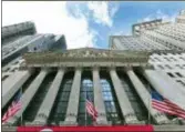  ?? RICHARD DREW — THE ASSOCIATED PRESS FILE ?? The facade of the New York Stock Exchange is shown. U.S. stocks finished broadly higher Wednesday, giving the S&P 500 its third gain in as many days.