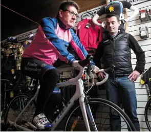  ??  ?? Austin Walsh of Quay Cycles casts an expert eye over Paul Kimmage’s reach and saddle height in the Drogheda bike shop