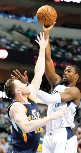  ??  ?? HERO FOR THE DAY. Harrison Barnes (right) scored 31 points, including eight in overtime to help Dallas rally from a 21-point deficit to beat Utah, 112-105.