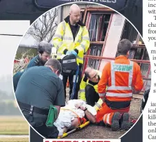  ??  ?? LIFESAVER With injured man in Wisbech, 2016