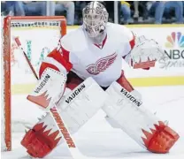  ?? MARK HUMPHREY/ THE ASSOCIATED PRESS ?? The Red Wings have agreed to terms with goalie Jimmy Howard, which more than doubles his current salary. ‘ He’s played well,’ says Detroit coach Mike Babcock.