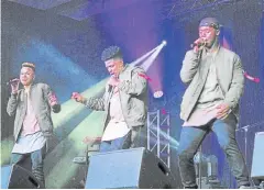  ??  ?? IDOL EXPERIENCE: Former ‘Idols SA’ contestant­s, from left, Bevin Samuels, Keegan Martin and Loyiso Gijana perform at the Boardwalk tonight