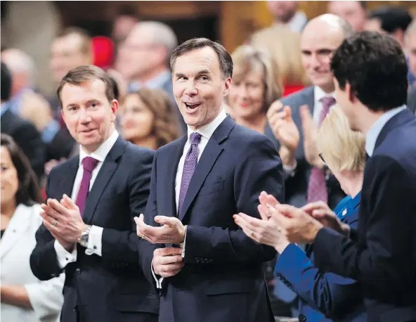  ??  ?? ‘It is a plan that puts people first — that invests in Canadians and in the things that matter most to them,’ Finance Minister Bill Morneau says of the federal budget for 2018. — THE CANADIAN PRESS