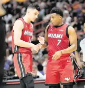  ?? AL DIAZ adiaz@miamiheral­d.com ?? The Heat was open to trading veteran point guard Kyle Lowry, right, but Miami didn’t make any deals.