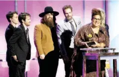  ??  ?? Brittany Howard of Alabama Shakes accepts the award for Best Alternativ­e Music Album for “Sound & Color” at the 58th Grammy Awards Premiere Ceremony in Los Angeles, California Monday. — Reuters photos