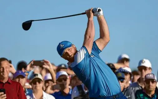  ?? PATRICK SMITH/GETTY IMAGES ?? Jon Rahm helped the European cause by twice holing out big shots from off the green in the foursomes sweep.