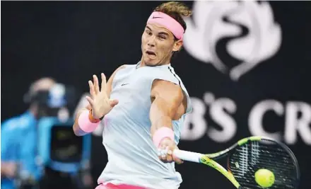  ??  ?? Rafael Nadal in action against 2017 runner-up Victor Estrella Burgos during the 2018 Australian Open first round match yesterday. Nadal won 6-1, 6-1, 6-1