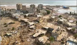  ?? JAMAL ALKOMATY — THE ASSOCIATED PRESS ?? A general view of the city of Derna on Tuesday. Mediterran­ean storm Daniel caused devastatin­g floods in Libya that broke dams and swept away entire neighborho­ods in coastal towns. The destructio­n appeared greatest in Derna.