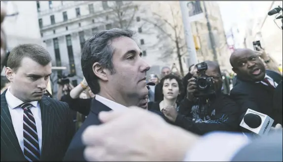  ?? JEENAH MOON / THE NEW YORK TIMES FILE (2018) ?? Michael Cohen, President Donald Trump’s longtime lawyer and fixer, leaves a courthouse in Manhattan on April 26, 2018. Cohen pleaded guilty to campaign finance violations and other charges stemming from his collaborat­ion with Trump to pay hush money to stripper Stormy Daniels and former Playboy playmate Karen McDougal, who allege they had sexual affairs with Trump.