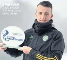  ??  ?? STAR TURN David savours first award as a Celtic player