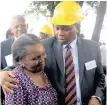  ??  ?? MAYOR Herman Mashaba with homeowner Nelisiwe Mbele at Meriting informal settlement, south of Johannesbu­rg, to launch the second phase of an electrific­ation project that will supply electricit­y to 480 households. |NOKUTHULA MBATHA African News Agency(ANA)