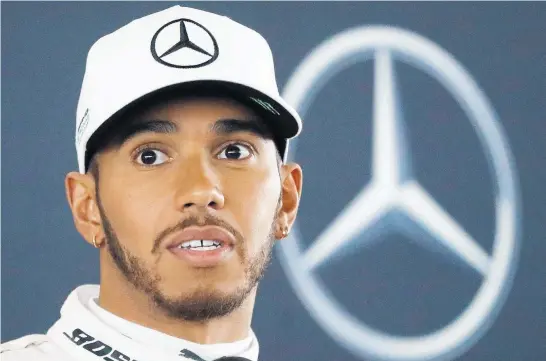 ?? Picture / AP ?? Lewis Hamilton, at the launch of the new Mercedes last month, is favoured to win the drivers’ championsh­ip.