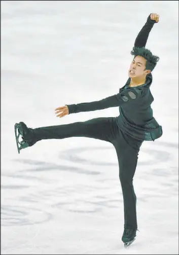  ?? Martin Meissner The Associated Press ?? American Nathan Chen performs at the Figure Skating World Championsh­ips in Stockholm. Chen, 21, of Salt Lake City, won his third straight title.